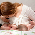 bigstock Breastfeeding Twin Babies With 110728199 | Stay at Home Mum.com.au