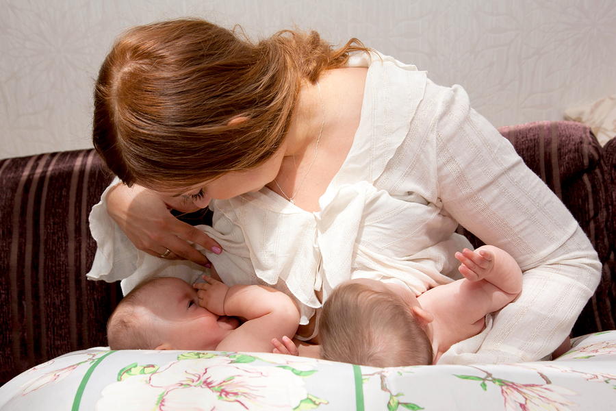 bigstock Breastfeeding Twin Babies With 110728199 | Stay at Home Mum.com.au