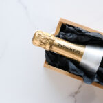 bigstock A Champagne Bottle And A Gift 291067486 | Stay at Home Mum.com.au
