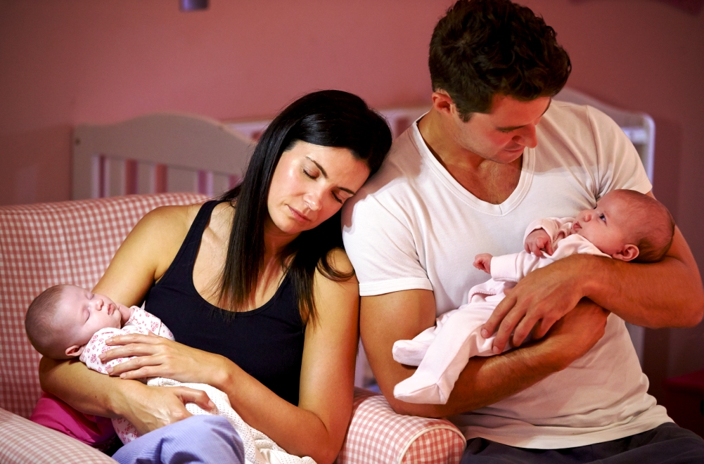 bigstock Tired Parents Cuddling Twin Ba 78517508 1 | Stay at Home Mum.com.au