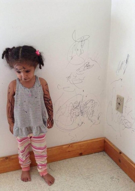 little girl drawing on wall | Stay at Home Mum.com.au