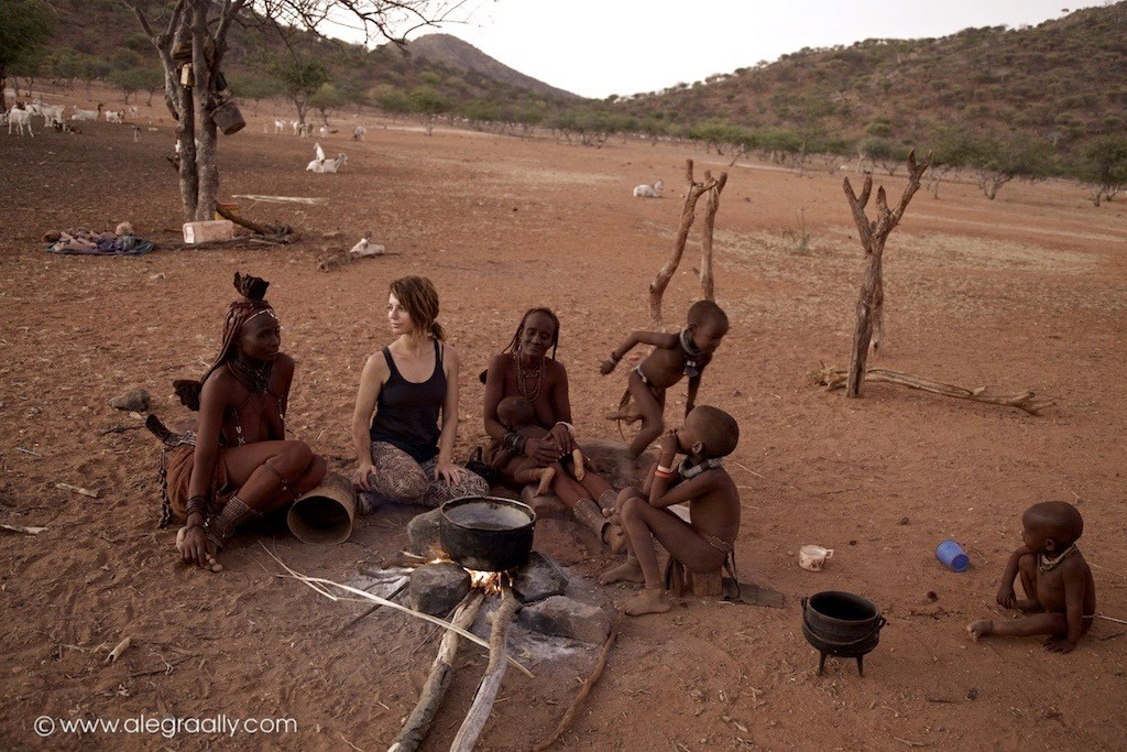 Alegra Ally and a family of Himba women. Photo taken by Alegra Ally, Wild Born Project.
