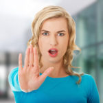bigstock Woman expressing stop sign wit 79876585 | Stay at Home Mum.com.au