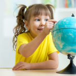 bigstock kid girl pointing at globe 84007997 e1492607485214 | Stay at Home Mum.com.au