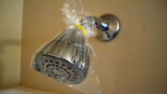 cool how to clean shower head tie a bag of vinegar around your it with no effort | Stay at Home Mum.com.au
