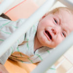 bigstock Baby In The Crib 14736080 | Stay at Home Mum.com.au