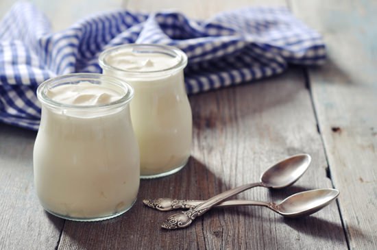 jars of yogurt on a wooden table | Stay at Home Mum.com.au