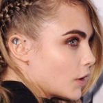 cara delevingne takes up knitting and shows inner ear tattoo with cara delevingne tattoo e1490103879482 | Stay at Home Mum.com.au