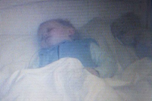 Couple Spooked When Ghost Baby Appears Beside Toddler In His Cot