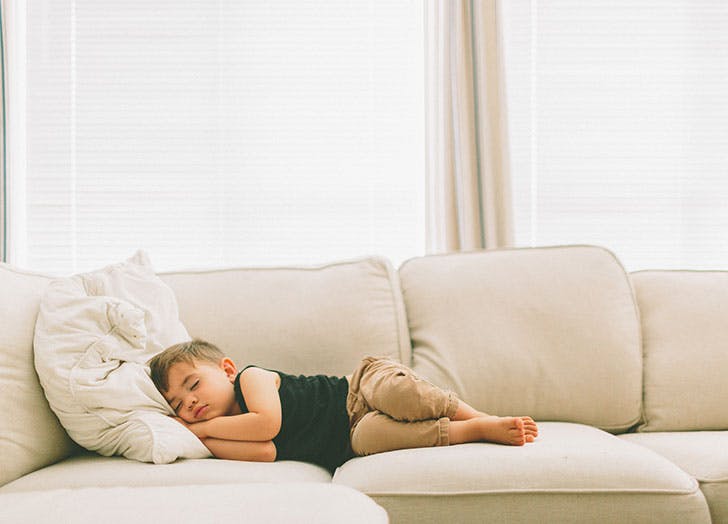 Cute kid sleeping on couch | Stay at Home Mum.com.au