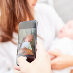 bigstock Father takes picture of baby a 328221019 | Stay at Home Mum.com.au