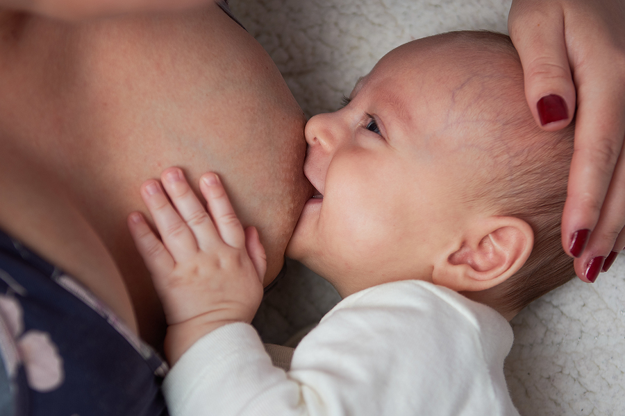 Woman Breastfeeding | Stay at Home Mum
