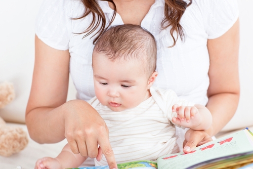 mom reading baby | Stay at Home Mum.com.au