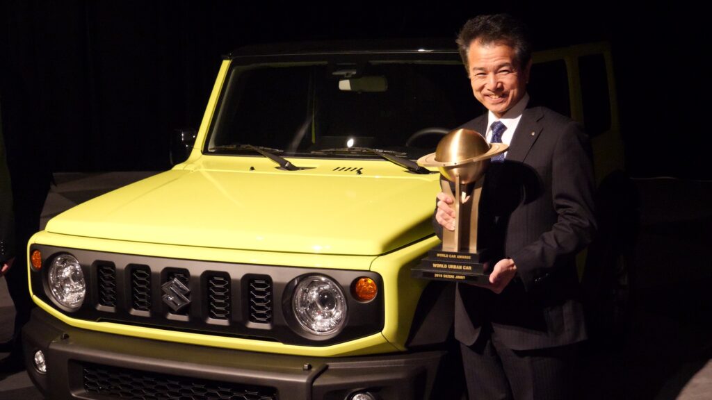 JIMNY World Urban Car of The Year trophy being held by the Jimnys Chief Engineer Mr Hiroyuki Yonezawa | Stay at Home Mum.com.au