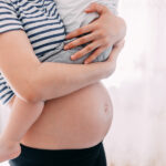 Don't kiss your kids? Questioning the recent advice about CMV in pregnancy
