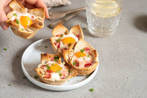 This image has an empty alt attribute; its file name is bigstock-Baked-Egg-Bacon-And-Toast-Cup-288828709.jpg