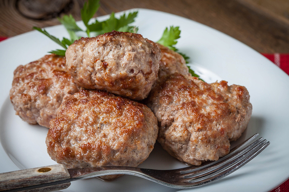 This image has an empty alt attribute; its file name is bigstock-Meatball-With-Parsley-253664329.jpg