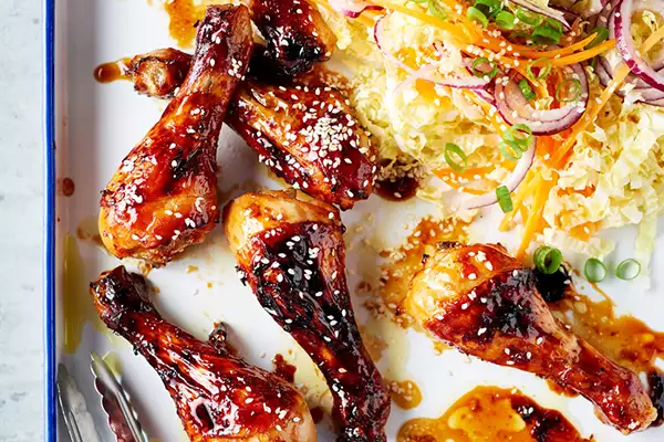 Sticky Chicken Drumsticks with Asian Slaw