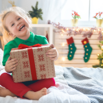 kids opening gift | Stay at Home Mum.com.au